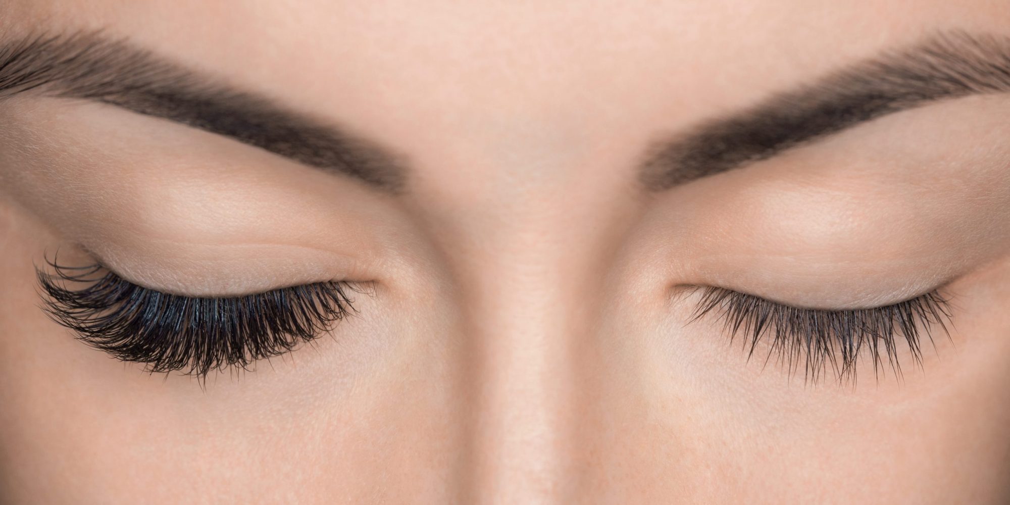 Eyelash removal procedure close up. Beautiful Woman with long lashes in a beauty salon. Eyelash extension.